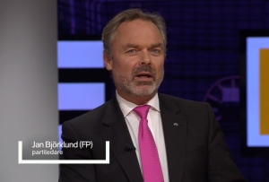 Jan Björklund och den rosa slipsen.